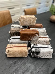 Description: 8.5" L x 3.5" W x 4" H Cowhide Zippered Bag Each Hide Varies Please email us at orders@elevatedliving.design if you would like to request a certain color If you have questions about shipping, delivery or returns, please view our Shipping & Returns Policy, call our customer support team at 833-353-1995, or email us at support@elevatedliving.design. Cowhide Makeup Bag, Western Makeup Bag, Boutique Aesthetic, Western Stuff, Western Bag, Cowgirl Accessories, Western Handbags, Cowgirl Gifts, Make Up Bags