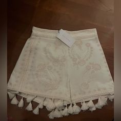 New Used Beautiful Zara Shorts With Embroidered Details And Tassels. Size Small White Bottoms With Tassels For Spring, Bohemian Embroidered Beige Bottoms, Beige Bohemian Embroidered Bottoms, White Fringed Bottoms For Summer, Embroidered Cotton Shorts For Vacation, Zara White Bohemian Bottoms, Bohemian Bottoms With Embroidered Hem, Zara Bohemian White Bottoms, White Bohemian Zara Bottoms