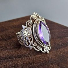 Handmade Bohemian / Art Deco Amethyst Ring Set on 925 Sterling Silver.  Size 8 This Art Deco inspired Amethyst ring featurss great details of ornamental lines. The amethyst in fiery and a beautiful light purple in color. The ring is in good used condition with some minor wears. Please see photos for details. Silver Bohemian Amethyst Rings, Bohemian Sterling Silver Amethyst Ring With 925 Stamp, Bohemian Sterling Silver Amethyst Ring, Bohemian Purple Rings Stamped 925, Bohemian Silver Amethyst Ring In Sterling Silver, Bohemian Amethyst Ring In Sterling Silver, Bohemian Silver Amethyst Ring, Bohemian Silver Amethyst Ring With Stone Setting, Bohemian Sterling Silver Purple Rings