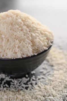 white rice in a black bowl on a table