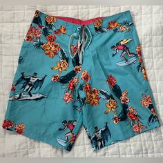 Like New Condition - Never Worn! Blue And Pink Floral Hawaiian Swim Shorts / Trunks With Liner, Featuring Batman And Robin On Surfboards. Men’s Size Medium, ~32 Waist. Blue Relaxed Fit Swim Trunks For Summer, Blue Surfing Bottoms For Beach Season, Casual Blue Relaxed Fit Swim Trunks, Blue Bermuda Summer Bottoms, Blue Cotton Swim Trunks With Relaxed Fit, Short Blue Bottoms For Surfing, Blue Summer Surfing Bottoms, Blue Shorts For Surfing, Blue Short Bottoms For Surfing