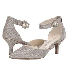 Anne Klein Women's Fabulist Textured Pointed Toe Ankle Strap Heels / Pumps. Colorway Is Platinum (Silver And Gold Mixed). Women's Size 8. Condition: New In Box; Box Has Wear. New To Poshmark? Sign Up Using Invite Code: Tentoday For $10 Off Your Purchase! - Anne Klein Iflex Technology Allows For A Flexible Fit That Can Bend Up To 90 Degrees. - The Anne Klein Fabulist Pump Will Showcase Your Fabulous Style With A Two-Piece Silhouette And A Pointed Toe. - Leather, Fabric, Or Synthetic Uppers. - Adj Silver Ankle Strap Kitten Heels For Formal Occasions, Silver Ankle Strap Kitten Heels For Formal Events, Spring Metallic Low Heel Shoes, Elegant Silver Kitten Heels With 4-inch Heel, Formal Silver Ankle Strap Kitten Heels, Formal Silver Kitten Heels With Ankle Strap, Chic Silver Closed Toe Kitten Heels, Silver Kitten Heels For Spring Evening, Elegant Silver Kitten Heels For Spring