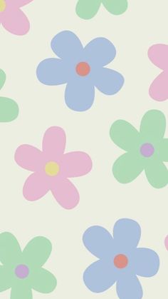 an image of colorful flowers on a white background with pink, blue and green colors