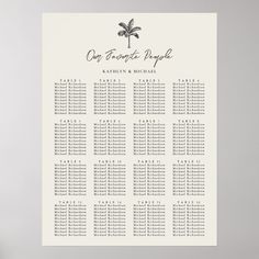 a white and black wedding seating chart with palm trees on the back, in front of a gray background