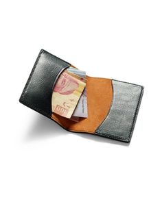 Each journey begins with The Departure – our signature collection of luxury leather goods, handmade by the master artisans of Florence, Italy. Crafted from a pliable, suede-lined vacchetta calfskin leather, the Bifold Wallet is ideal for carrying an assortment of currencies and cards, in a compact size that slips easily into any pant or jacket pocket. Take pleasure as the leather breaks in and ages with every trip, short or long, becoming infused with the essence of the destination, and more imp Black Leather Trifold Card Holder, Modern Leather Card Holder For Business, Modern Leather Business Card Holder, Modern Leather Card Holder With Interior Slots, Luxury Leather Bifold Wallet, Luxury Trifold Card Holder With Coin Pocket, Leather Business Card Holder With Interior Slots, Luxury Leather Trifold Wallet For Formal Occasions, Luxury Trifold Wallet With Card Slots For Travel