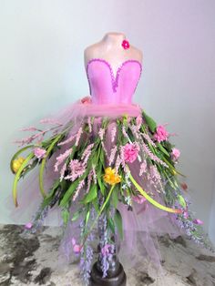 a dress made out of flowers and tulle