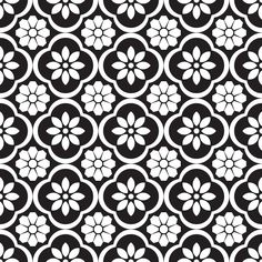 a black and white flower pattern with circles in the center, on a dark background