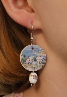 "New England Headlands by Childe Hassam Beautiful archipelago and sea inspired earrings to transport you just a little bit closer to the sea.  Show your love for the fine arts with our unique handmade earrings. You can wear these enchanting accessories at any given time and occasion to show others you're just as beautiful the painting. ✷ HANDMADE ✷  Handmade with love and care with high-quality wood and metal. Handcrafted in Finland with locally bought materials. ✷ Weatherproof ✷  The earrings have been coated with a weatherproof coating spray. No need to worry about rain!  ✷ Allergy-friendly ✷  All of our earrings are made with nickel tested / nickel free materials to insure that everyone's ears are safe wearing our earrings.  ✷ A Great Gift for Art Lovers ✷  You can also give our earring Sea Inspired Earrings, Childe Hassam, Unique Handmade Earrings, Art Earrings, Sea Inspired, Gifts For Art Lovers, Welcome Gifts, Fine Arts, Fun Bags