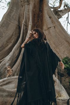 Black Khadi Boho Poncho is a gem of our raw handwoven cotton collection. We always pay attention to the details and quality. Brining back to live ancient technics and tradition crafts. Each tassel in this royal poncho is bounded manually that is why, It takes 3 working days to create such a boho cover up by our artisans. This garment is made to flow freely around any type of figure and can be worn as plus size clothing. Pure handwoven cotton fabric is natural and breathable, making this kimono r Long Poncho, Beach Wrap Dress, Zodiac Fashion, Boho Photoshoot, Greek Goddess Dress, Boho Womens Clothing, Boho Poncho, Bridal Cover Up, Witchy Crafts