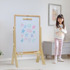 Little Partners® Contempo Art Easel features a two-sided design that includes a chalkboard and white board. The large surface gives your child the space and versatility to color, paint, play, and experiment in a variety of different mediums. Built-in storage allows for easy access to supplies, while the adjustable height starts out low for young budding artists (10.5"). PRODUCT INFORMATION Little Partners® Contempo Art Easel includes an extra-large, two-sided design surface featuring a chalkboard on one side and magnetic white board on the opposite side.  EZ Assembly™ in less than 10 minutes with two screws and two fasteners included. Easel shelf includes four spill-proof paint cups to help to prevent spills and keep art supplies organized and on hand, a built-in magnetic strip for holding Kids Art Easel, Paint Cups, Window Markers, Playground Safety, Art Supply Organization, Learning Tower, School Chalkboard, Liquid Chalk, Art Easel