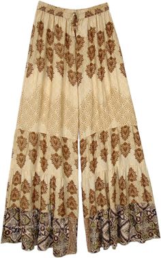 Brown flora print on wide-leg pants, which are soft and flowy, wide legs with a flair of a complementary graphic print.  The loose-fit wide-leg printed mix palazzo pants have a comfortable waist that will fit a small to a large. #tlb #SplitSkirtsPants #Printed #bohemianfashion #festivalpants Bohemian Summer Pants With Printed Motifs, Summer Bohemian Pants With Printed Motifs, Patterned Bottoms With Boho Print For Spring, Printed Wide Leg Pants For Vacation, Floral Print Ankle-length Harem Pants, Summer Patterned Wide Leg Harem Pants, Summer Patterned Printed Wide Leg Pants, Summer Wide Leg Patterned Pants, Bohemian Wide Leg Patterned Bottoms