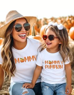 Cute Mommy and Mommy's pumpkin t-shirts for mommy and son or mommy and daughter. Great fashion for the fall season. T-shirts sold separately. Order child size in our mommy and me section.  * 100% combed and ring-spun cotton (Heather colors contain polyester) * Fabric weight: 4.2 oz./yd.² (142 g/m²) * Pre-shrunk fabric * Side-seamed construction * Shoulder-to-shoulder taping * Blank product sourced from Nicaragua, Mexico, Honduras, or the US This product is made especially for you as soon as you White T-shirt For Fall Family Matching, Mom And Me Fall Shirts, Mommy And Me Thanksgiving Shirts, Mama Pumpkin Shirt, Pumpkin Shirt Mam And Child, Mama Mini Cheetah Shirt, Matching Tshirts, Pumpkin Tshirt, Mommy And Son