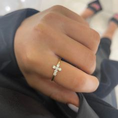 Our Little Grace Diamond Cross Ring is a twinkling token of faith. The intentional delicacy of this design makes for the heartfelt gift of a child's first piece of fine jewelry or an adult's everyday dainty wear. Metal: 18k White Gold / 18k Yellow Gold / 18k Rose Gold 6 Round Brilliant Cut Natural Diamonds: Approx. 0.24 ctw G/H Color and SI1-2 Clarity Diamonds Diamond Cross Ring For Gift, Diamond Cross Rings For Gifts, Cross-shaped Diamond Ring For Gift, 14k Yellow Gold Cross Rings, 14k Gold Stackable Rings With Vvs Clarity For Gift, Dainty Hallmarked Yellow Gold Diamond Ring, Gold Diamond Cross Ring, Gift White Gold Diamond Ring In 14k, Dainty Diamond Ring For Gift