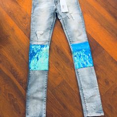 Manila Grace Distressed Denim Stretch Jeans With Blue Opal Embellished Sequin Knee. Great Way To Elevate Your Denim Luck Flattering Jeans New With Tags True To Size. Straight Leg Denim Bottoms With Sequins, Straight Leg Denim Sequined Bottoms, Straight Leg Denim Jeans With Sequins, Straight Leg Sequin Denim Jeans, Sequined Straight Leg Denim Bottoms, Sequined Straight Leg Denim Jeans, Embellished High Rise Denim Jeans, High Rise Embellished Denim Jeans, Embellished Fitted Dark Wash Jeans