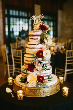 a wedding cake sitting on top of a table