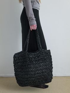 NOTHINGEVERYTHING is a brand that experiments with the diversity of materials.- This is a handmade knit big bag- Used two different textured materials- Used  polypropylene, an eco-friendly plastic material- Can be worn as a shoulder or tote bag Black Woven Plastic Bag, Modern Black Woven Bag, Black Crochet Bag With Braided Handles For Shopping, Modern Black Woven Straw Bag, Modern Black Rectangular Straw Bag, Black Woven Crochet Bag For Everyday, Black Recyclable Tote Shoulder Bag, Black Crochet Bag With Braided Handles, Everyday Black Woven Crochet Bag