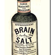 an old bottle of brain salt sitting on top of a table