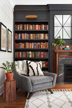 a living room filled with lots of books