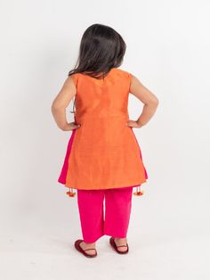 Rust chanderi Kurta with zari embroidery and malmal separate innder with cotton pajamas. Color: Orange and Pink Fabric: Chanderi and Cotton Note: The product will be delivered within 2-4 weeks of order placed Wash Care - Dry clean only No returns and Exchange. Measure before ordering to avoid any returns. Measurements: SIZE CHART FOR GIRLS Age CHEST ROUND WAIST ROUND KURTA LENGTH SLEEVE LENGTH BOTTOM LENGTH CHEST ROUND (ANGRAKHA) DRESS LENGTH (angrakha) LEHENGA BLOUSE LENGTH LEHENGA CHEST LEHENG Festive Cotton Designer Sets, Festive Cotton Churidar With Gota Work, Cotton Churidar For Eid Puja, Embroidered Palazzo Set For Eid And Puja, Cotton Churidar For Puja And Eid, Cotton Silk Sets With Resham Embroidery For Navratri, Cotton Saree Set With Gota Work, Cotton Sets With Zari Work In Traditional Drape, Festive Cotton Sharara With Pallu