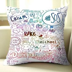 a pillow that is sitting on a couch in front of a window with the words like michael written all over it