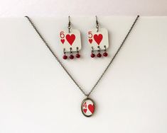 "Need a fun and unique gift for your bridge or poker group? Want to remember a recent trip to Vegas? These jewelry pieces are one-of-a-kind and are hand-crafted from playing cards. They're sure to stand out! All cards are the Bicycle brand, and you can see the familiar pattern on the back of the earrings (fifth image). The earrings have the finishing touch of dangling red glass beads. The necklace comes with a lobster-type clasp, and the chain is 18\" long unless requested otherwise. All the met Trip To Vegas, Poker Gifts, Hearts Playing Cards, Bicycle Cards, Card Necklace, Shrinky Dink, Group Gifts, Recycled Jewelry, Plastic Jewelry