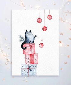 a card with a black cat sitting on top of presents