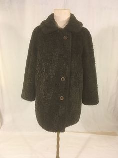 "vintage 1970s women's fake fur coat chocolate brown Susan Lynn, Quality by Item House Inc. brown acetate lining brown buttons up front w/smaller clear neck button side pockets good vintage condition, light wear no label size, see below measures, lying flat, shoulder-n/a-raglan seams, where jacket starts to slope down-about 17\"  chest-20 1/2\" sleeve from underarm-13\" length-33\"     We do not offer returns or refunds unless something is grossly misrepresented. Please contact us within 2 busin 1970s Womens Fashion, Dark Brown Coat, 1970s Fashion Women, Persian Lamb, 1970s Women, Fake Fur, Brown Coat, Vintage 1970s, Chocolate Brown