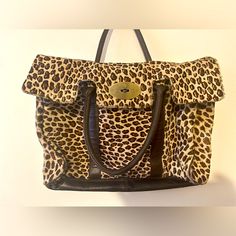 Mulberry Brown Animal/Tiger/Leopard Skin Print Luxury Leopard Print Top Handle Bag, Leopard Print Travel Bag With Top Carry Handle, Leopard Print Satchel Shoulder Bag With Leather Handles, Leopard Print Leather Shoulder Bag With Top Handle, Leopard Print Travel Bag With Animal Design, Leopard Print Everyday Use Bag With Animal Design, Leopard Print Bag With Animal Design For Everyday, Luxury Leopard Print Bag With Removable Pouch, Chic Leopard Print Tote Satchel