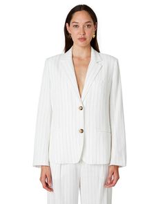 The Felix Blazer White embodies the essence of modern sophistication in outerwear. Its clean and sleek composition features a flattering tailored silhouette, exuding an air of timeless grace. Pair this pinstripe statement piece with the matching Luca... Pinstripe Blazer With Lapel Collar For Work, Tailored Pinstripe Blazer For Work, Pinstripe Blazer For Work, Classic Pinstripe Blazer For Office Wear, Elegant Striped Blazer With Hidden Buttons, Striped Blazer With Hidden Button Closure For Work, Elegant Pinstripe Outerwear For Office, Elegant Pinstripe Blazer With Hidden Buttons, Elegant Pinstripe Blazer With Hidden Button Closure