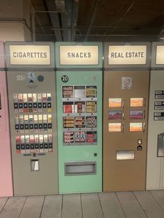 three vending machines sitting next to each other