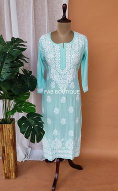 Description ▪ Kurti Fabric: Modal ▪ Kurti Length: 44-46 Inches ▪ Sleeves: 3/4 Sleeves ▪ Style: Straight Kurti ▪ Occasions: Party Wear, Office Wear, Festive Wear ▪ Garment Care: Hand Wash Only ▪ Price Includes: 1x Kurti Fitted Blue Sharara With Straight Kurta, Blue Georgette Kurta For Summer, Summer Blue Georgette Kurta, Fitted Chikankari Embroidery Dress For Navratri, Fitted Cutdana Sharara For Summer, Blue Traditional Salwar Kameez For Summer, Fitted Resham Embroidery Churidar With Straight Kurta, Traditional Blue Salwar Kameez For Summer, Fitted Straight Kurta With Resham Embroidery