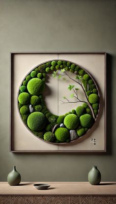 a painting with green plants and rocks in the shape of a circle on a wall