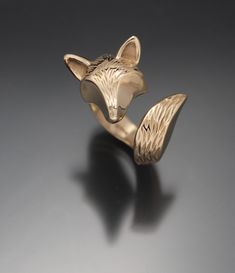 the fox ring has been my most popular ring so i made this one adjustable and engraved deeper fur . cast in a low tarnish bronze it will look like gold for a long time see other listing for eyes Bigfoot Drawing, Bronze Accessories, Fox Ring, Fox Jewelry, Animal Ring, Wolf Necklace, Diamond Eyes, Animal Rings, Unusual Jewelry