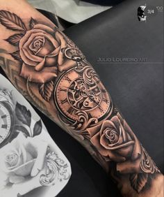 a man's arm with a clock and roses on it