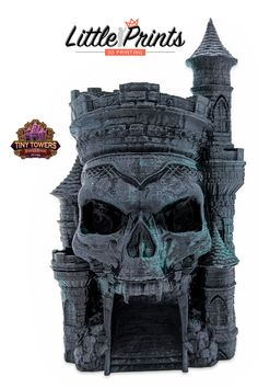 a fake skull is in front of a castle with a tower on it's side