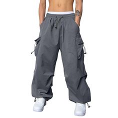 PRICES MAY VARY. ✅✅【Baggy Cargo Pants Men】Trendy and Hip Hop Style: These baggy cargo pants feature a loose fit and a hip hop harem design, making them a stylish choice for fashion-forward individuals. The unique style adds an urban edge to your outfit, allowing you to express your personal style with confidence. ✅✅【Mens Baggy Pants】Functional Cargo Pockets: These pants are equipped with multiple cargo pockets, providing ample storage space for your essentials. Whether you need to carry your pho Y2k Track Pants, Baggy Joggers, Mens Cargo Trousers, Cargo Hose, Cargo Work Pants, Trousers Mens, Trousers Men, Baggy Cargo Pants