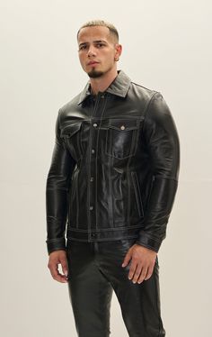 Crafted from premium leather, this jacket boasts durability and a luxurious feel. The leather is typically sourced from high-quality hides, ensuring a supple texture and robust performance. The stitching is often reinforced for longevity, emphasizing both style and functionality. SIZE + FITTailored fit, to find your correct size use the ''what's my size '' button. COMPOSITION 100% Lambskin LeatherMade in TurkeyStyle #: 71479CARESpecialist Leather Clean Only Masculine Black Leather Jacket For Work, Masculine Fitted Black Leather Jacket, Black Leather Outerwear, Classic Black Leather Jacket With Pockets, Classic Leather Jacket With Contrast Stitching, Classic Black Leather Jacket With Padded Collar, Black Leather Jacket With Double-needle Stitching, Fitted Masculine Black Outerwear, Black Fitted Masculine Outerwear