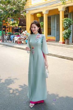 🌿 This set includes traditional Ao Dai, red pants. Style: Traditional Material: Very well made with high-quality gam (brocade) silk Collar: traditional collar Please provide bust-waist-and hip measurements when placing your order to ensure the best fit for you. 🌿 NOTE: * Recommend gentle washing * Please contact us for any inquiries about size. We don't have an exchange policy for the wrong size * It is safe for a washer and dryer in a "delicate" setting. * Actual Ao Dai colors may differ up to 10% due to lightning and viewing devices. * These ao dai pants are made based on Vietnamese size; they will run smaller than American size. *3D printed ao dai: you may see some white broken fabric around the seam (collar). *There might be some chalk/ pen writings on the fabric because it is brand Ao Dai Red, Lana Wedding, Wedding Ao Dai, Hot Pink Pants, Tea Wedding, Vietnamese Traditional Dress, Vietnamese Dress, Fancy Dresses Long, Simple Pakistani Dresses