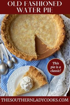 an old fashioned pie on a plate with a slice missing from it and two spoons next to it