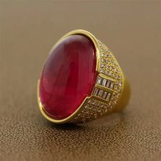 Rubelite Tourmaline Diamond Gold Cocktail Ring Luxury Oval Cabochon Ruby Ring, Luxury Ruby Oval Cabochon Ring, Luxury Ruby Ring Oval Cabochon, Luxury Ruby Ring With Oval Cabochon, Luxury Ruby Ring Oval Cabochon Polished Finish, Luxury Ruby Ring Oval Cabochon With Polished Finish, Luxury Ruby Ring With Oval Cabochon And Polished Finish, Half Bezel Setting, Half Bezel