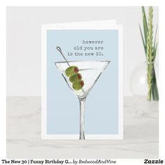 a card with a martini glass and olives on the rim reads, however old you are it's the new 50