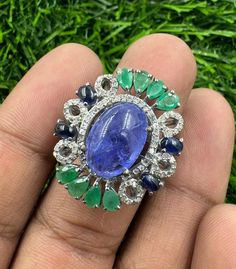 925 Silver Pave Diamond Jewelry, Natural Tanzanite, Blue Sapphire & Emerald Handmade Ring for Gift Stone : Natural Tanzanite , Pave Diamond, Emerald, Blue Sapphire Weight :  11.20 gram Stone Size : 10X14-3X5mm Metal : 925 sterling silver Cut Type : Oval Shipping -  Free Shipping Worldwide Delivered in 7 to 10 Working Days Return Policy - 30 Days Return Policy After Delivered For Any Queries Wholesale Gemstone World Note- Stone Weight and dimension are in approx. Round Multi-stone Tanzanite Gemstones, Silver Tanzanite Multi-stone Rings, Tanzanite Multi-stone Ring, Multi-stone Tanzanite Ring, Silver Sapphire Multi-stone Gemstones, Pave Diamond Jewelry, Emerald Blue, Natural Tanzanite, Pave Diamonds