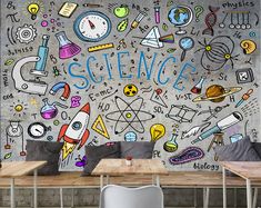 the science themed wallpaper is in an office space with two desks and chairs