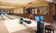 the bowling alley is empty and ready to be used for games or other activities,