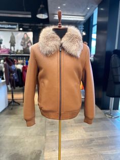 This beautiful jacket is made with real genuine sheep skin shearling & real fox. Premium Sheepskin Shearling Body. All of our products are ready to ship from New Jersey.  Item will be shipped within 1-3 business days after you have ordered. Please send us your chest and waist measurements before ordering. Made in Turkey. Please feel free to contact and ask any questions about sizes or any ideas. Brown Sheepskin Outerwear With Faux Fur Trim, Luxury Sheepskin Outerwear In Mink Color, Luxury Mink Shearling Fur Coat, Mink Colored Shearling Fur Coat With Faux Fur Trim, Mink Sheepskin Fur Coat With Faux Fur Lining, Mink Colored Sheepskin Fur Coat With Faux Fur Lining, Mink Color Sheepskin Fur Coat With Faux Fur Lining, Luxury Sheepskin Leather Jacket With Faux Fur Lining, Brown Sheepskin Leather Jacket With Faux Fur Lining