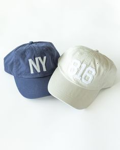 This customized baseball caps are the perfect addition to your casual outfit. Perfect way to represent your city, school, birth year, area code, etc. It is soft cotton & adjustable with a metal clip...could even work for youth. It's the perfect complement to a bad hair day!  FEATURES: >100% Cotton Twill >Vat dyed for true color, low profile, six panel >Leather strap, antique brass grommet and buckle >Four rows of stitching on self-fabric sweatband >Adams exclusive Cool-Crown mesh in coordinating colors. This hat is a true color hat. Prefer a stonewashed pigment dyed hat? Check out the link below! https://thepreppypair.etsy.com/listing/708287806/custom-area-code-hat-baseball-cap Cheap White Baseball Cap For Birthday, Adjustable Collegiate Six-panel Baseball Cap, Collegiate Six-panel Adjustable Baseball Cap, Adjustable Curved Brim Dad Hat For College, Adjustable Dad Hat For College, Adjustable Baseball Cap For College, Adjustable Six-panel Baseball Cap For College, Collegiate Baseball Cap With Curved Brim, Collegiate Adjustable Hat With Letter Print