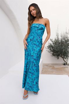 Experience the joy of luxurious ease in the Mermaid Tears Maxi Dress! A vision of beauty and an ode to paradise, this dress is sure to become a staple of your wanderlust wardrobe. Whether you are jet-setting to a breathtaking beachside escape or just dreaming of one. Style with heels and curls! Fitted maxi dress, true to size Strapless style with internal grip lining Overlay feature to bust  Elasticised back band Open back feature with cowl detailing Floral print throughout Invisible side zipper Not lined Lightweight, textured polyester Non-stretchy material Cold hand wash only Model wears XS Length from shoulder to hem: 128cm on an S Chest 34cm, Waist 33cm, size 8 White Dress Flowy, Spring Break Dress, Plunge Neck Maxi Dress, Mermaid Tears, Fitted Maxi Dress, White Long Sleeve Dress, Skirt And Top Set, Strapless Maxi Dress, Date Night Dresses