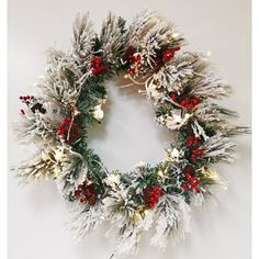 a christmas wreath hanging on the wall