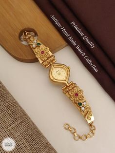 Description :- Womens Watch, Gold Personalized Watch, Engraved Watch, Gift for Her, Womens Gift, Gift for Wife, Bridesmaid Watch, Watches for Women Gift yourself a royal look with this perfectly crafted kundan necklace set from Manalisstudio. Crafted with high quality, it is impressive in design. The green enamel artwork adds perfect texture to the design. Perfect for weddings and festivities, this antique necklace set should be put on with your favorite sari or lehenga. 100% Satisfaction. Long Watch Accessories With Diamond Hour Markers For Gifts, Luxury Watches With Bracelet Strap For Weddings, Luxury Bracelet Strap Watches For Weddings, Anniversary Watch With Bracelet Strap And Round Dial, Luxury Wedding Watch With Bracelet Strap, Yellow Gold Watch With Rectangular Dial For Gift, Yellow Gold Watch With Rectangular Dial As Gift, Engraved Yellow Gold Watches For Wedding, Anniversary Jewelry And Watches With Metal Rectangular Dial