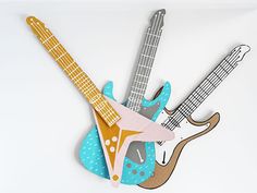 a paper cut out of an electric guitar